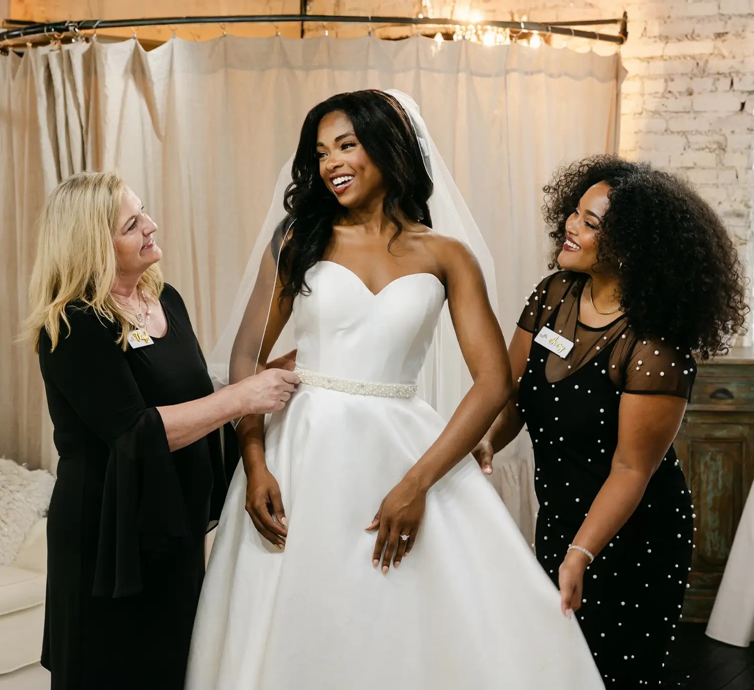 Model wearing a white gown